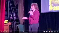 Rachel giving a TEDx talk